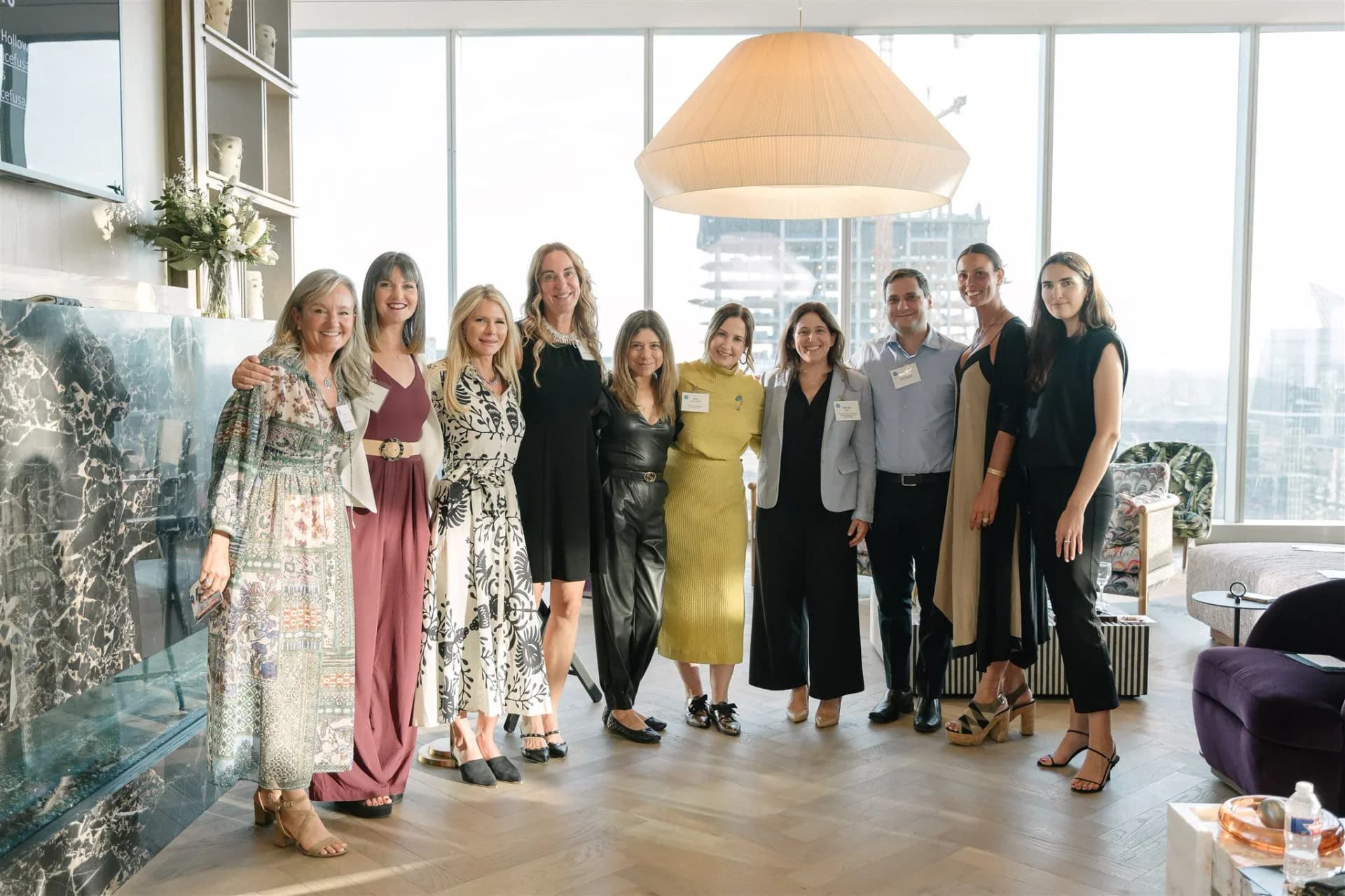 Corporate team portrait photographed in a bright business setting